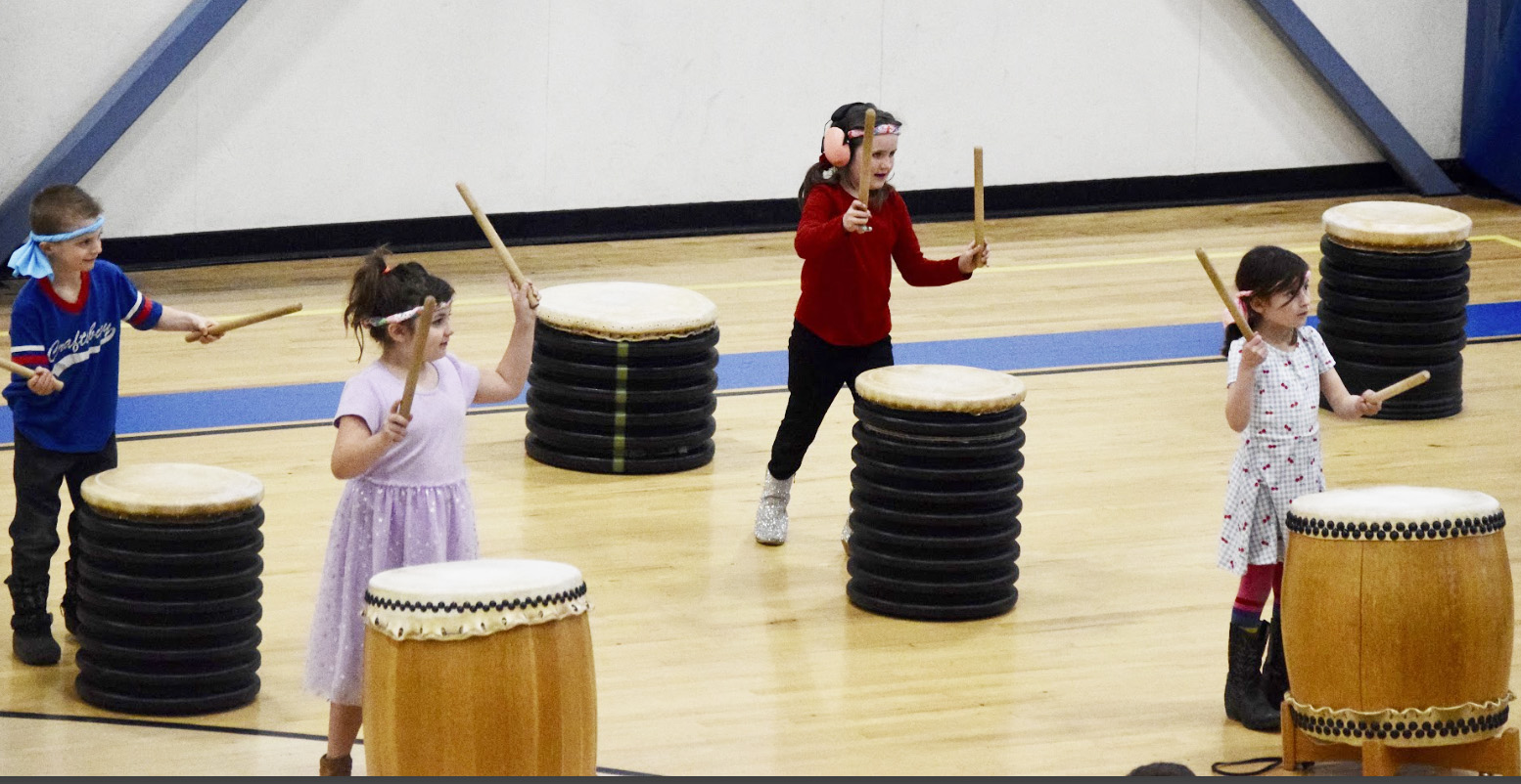 students playing drums